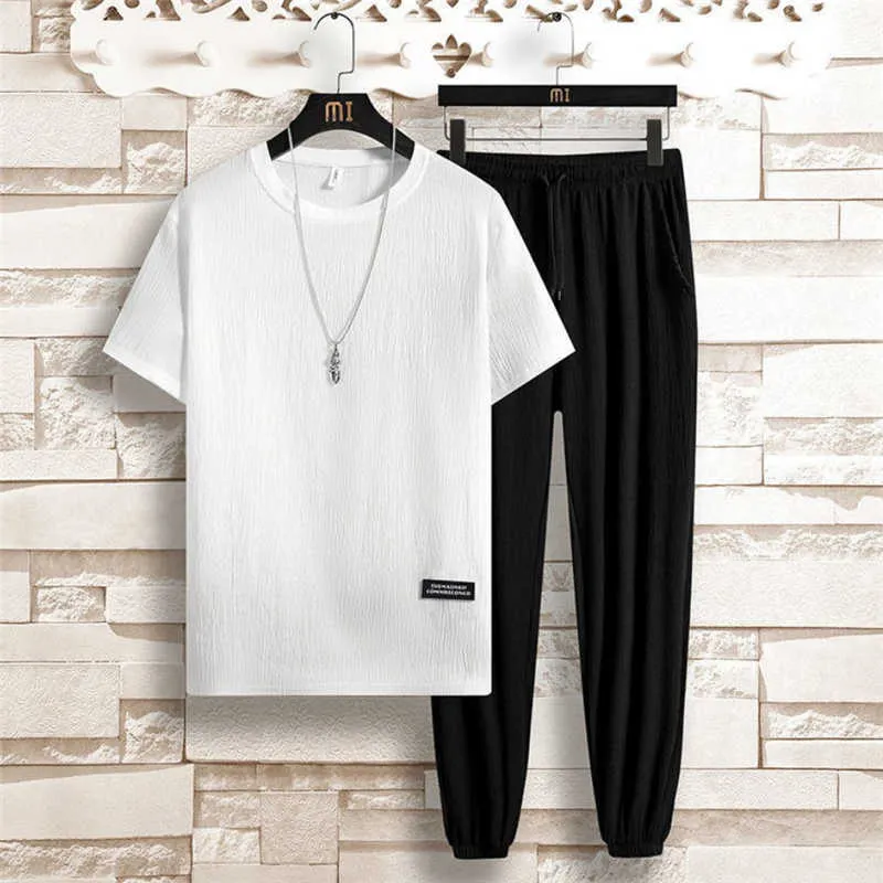 2021 Sommar Mäns Casual Sport Suit Short Sleeve Two-Piece Sets Mode Loose Ice Silk Pullover Toppar + Drawstring Byxor Stor storlek x0610