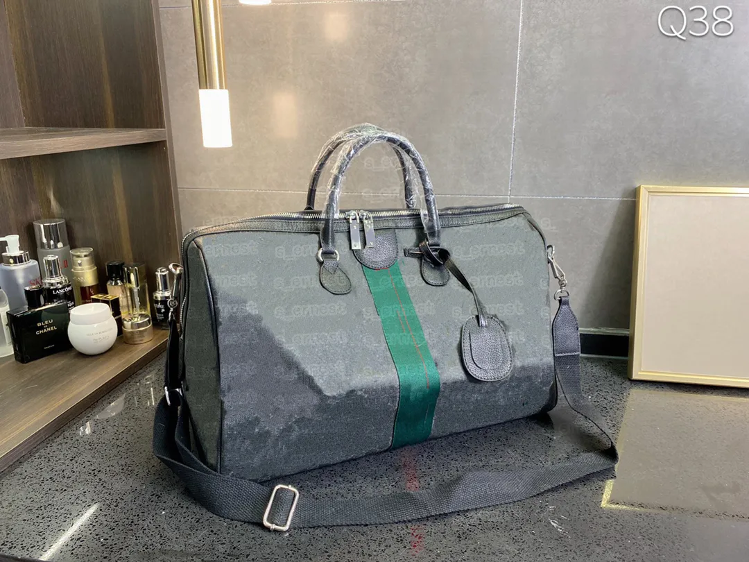 Duffle -väskor fortsätter alla kvinnor resväska män klassiska duffel rullande softsided resväska handbagage handväska Tote300o