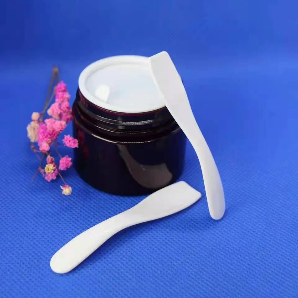 100 pz / lotto Mini cucchiai cosmetici Scoop Spatole bianche usa e getta 50mm strumento di plastica Crema Small259o