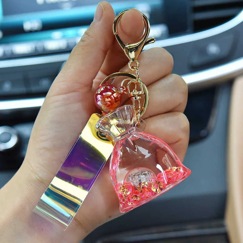 New Acrylic Glow Lucky Bag Liquid Keychain Creative Quicksand Bottle Key Chain Women Bag Pendant Car Keyring Trinket Lovely Gift G8409199