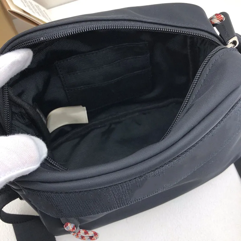 Sac de messager de créateur unisexe Sac à bandoulière Wallet Beach Wandering Backpack Handpack Handsbag Top Quality Purse Taille 22CM246A