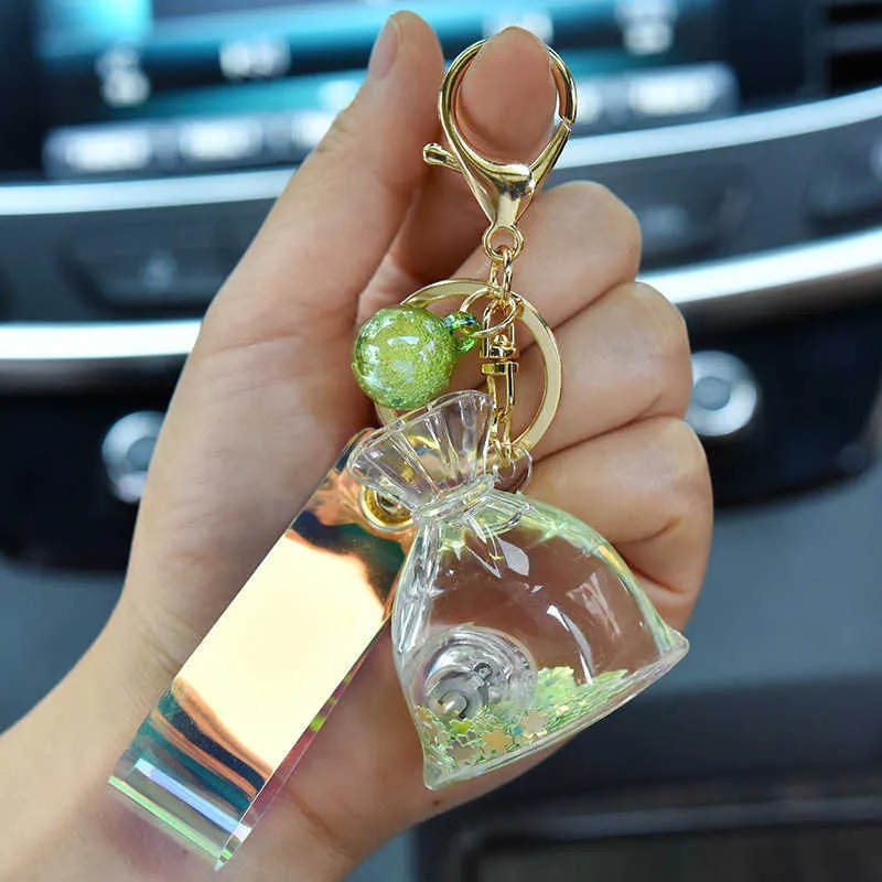 New Acrylic Glow Lucky Bag Liquid Keychain Creative Quicksand Bottle Key Chain Women Bag Pendant Car Keyring Trinket Lovely Gift G1019