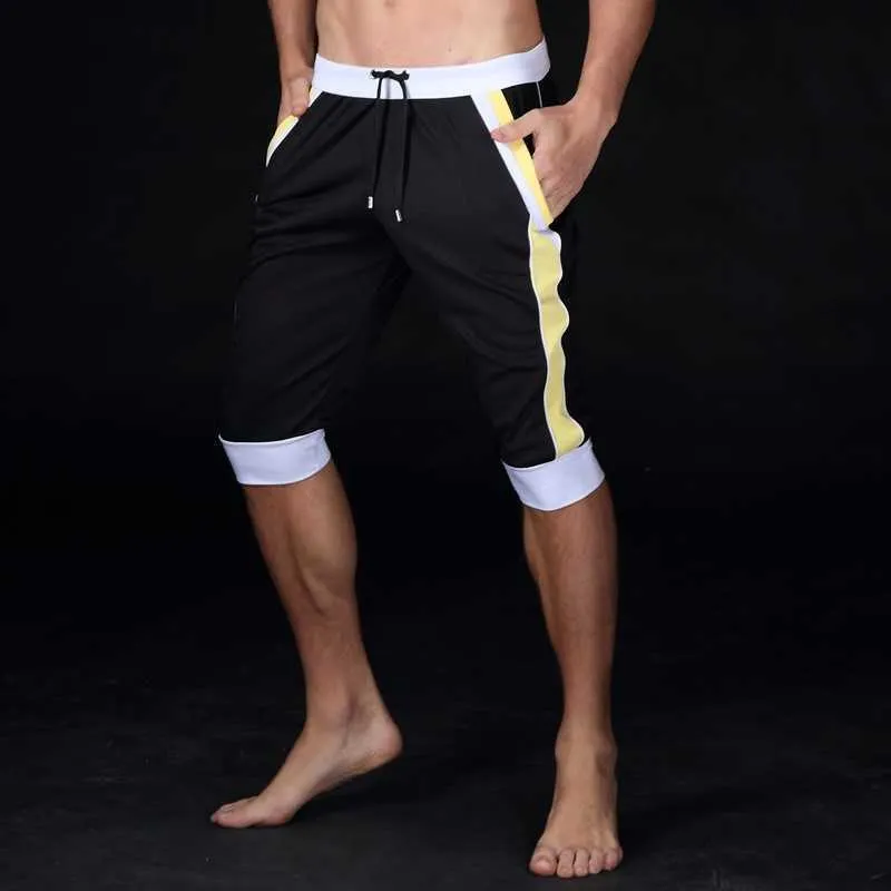 Loisirs d'été Shorts de sport hommes pantalons élastique marque Gyms s mode séchage rapide vêtements extérieurs à la maison 210714