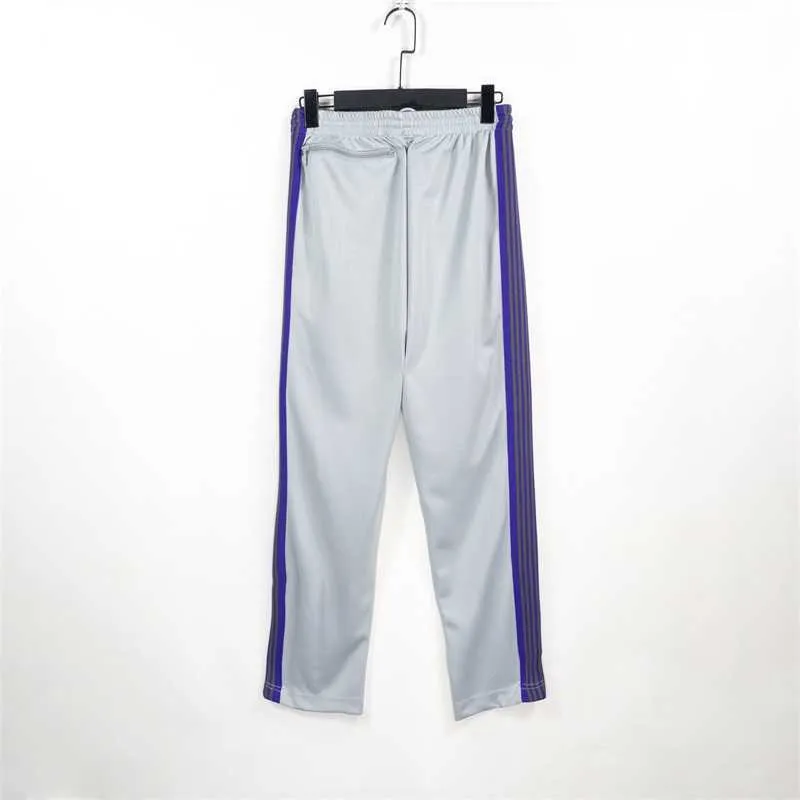 Trendy naalden vlinder borduurwerk casual broek gestreepte lint rechte sportbroek voor mannen en vrouwen