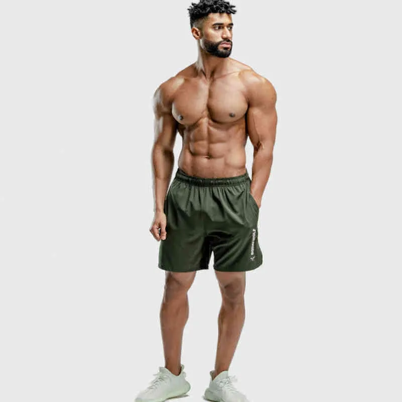 Mens Fitness Shorts Mens Gyms Loose Short Pants Joggers Workout Thin Quick dry Beach Shorts Male Summer Casual Crossfit Clothing G1218