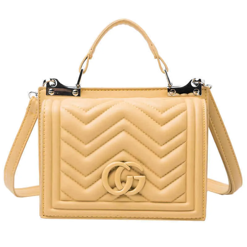 Designer bolsa feminina 2022 fábrica atacado novo modelo mãos diretas femininas primavera e verão coreano pequena tendência quadrada straddle um ombro sacos de estilo estrangeiro