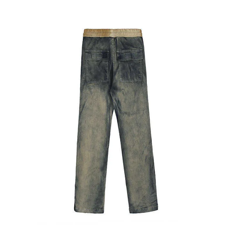 Мужские джинсы высокой улицы использовали мыть погружные джинсы