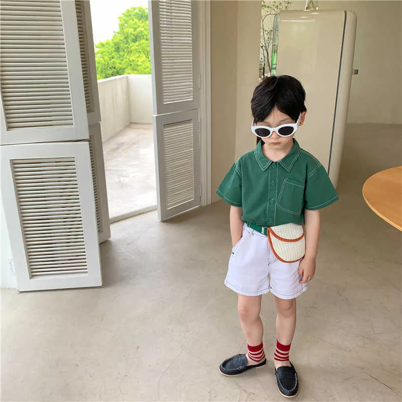 Korean style children fashion unisex solid color short sleeve shirts Boys girls loose single breasted Tops 210615