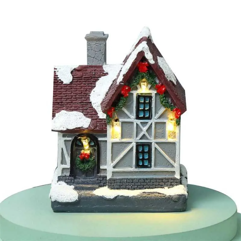 Statue de maison de village de scène de Noël avec lumière LED chaude fonctionnant à piles paysage de neige d'hiver construction en résine figurine miniature 211019