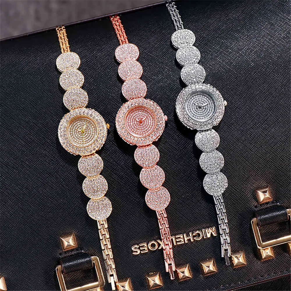 Moda Luksusowe Rhinestone Kobiety Zegarki Casual Crystal Dial Design Damska kwarcowe Zegarek Różowy Złoty Stal Bransoletka Pasek