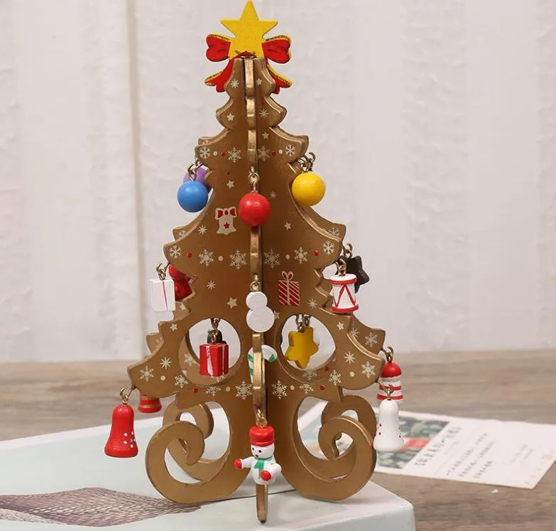 Decorazioni natalizie bambini in legno fatte a mano con disposizione tridimensionale della scena dell'albero