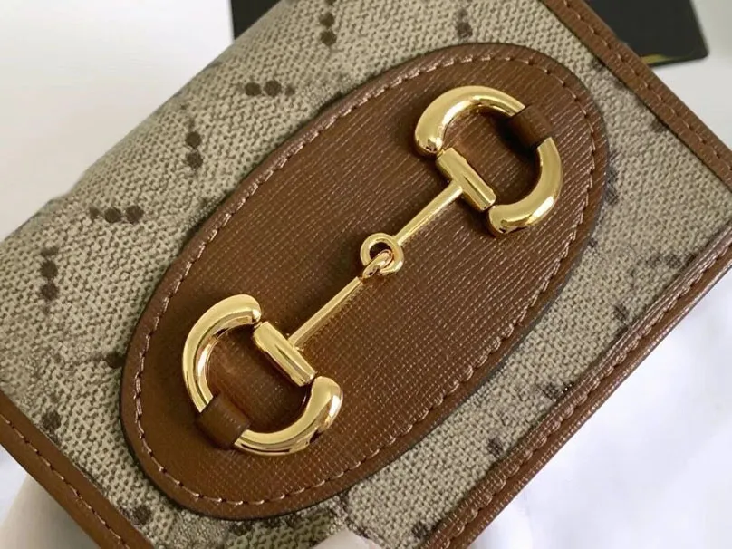Fábrica Venta directa de alta calidad Diseñador Fashion Fashion Patrón cruzado Golpea de oro Lona de cuero Cambio de llave de llave Bag Hand Deli231i