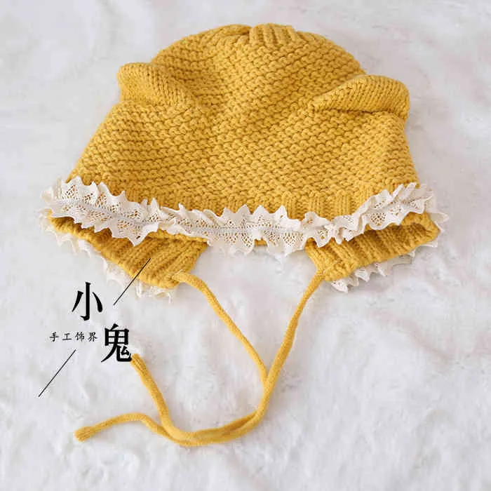 Oreille de chat Lolita douce fille japonaise laine faite à la main femme automne et hiver dentelle française chapeau chaud