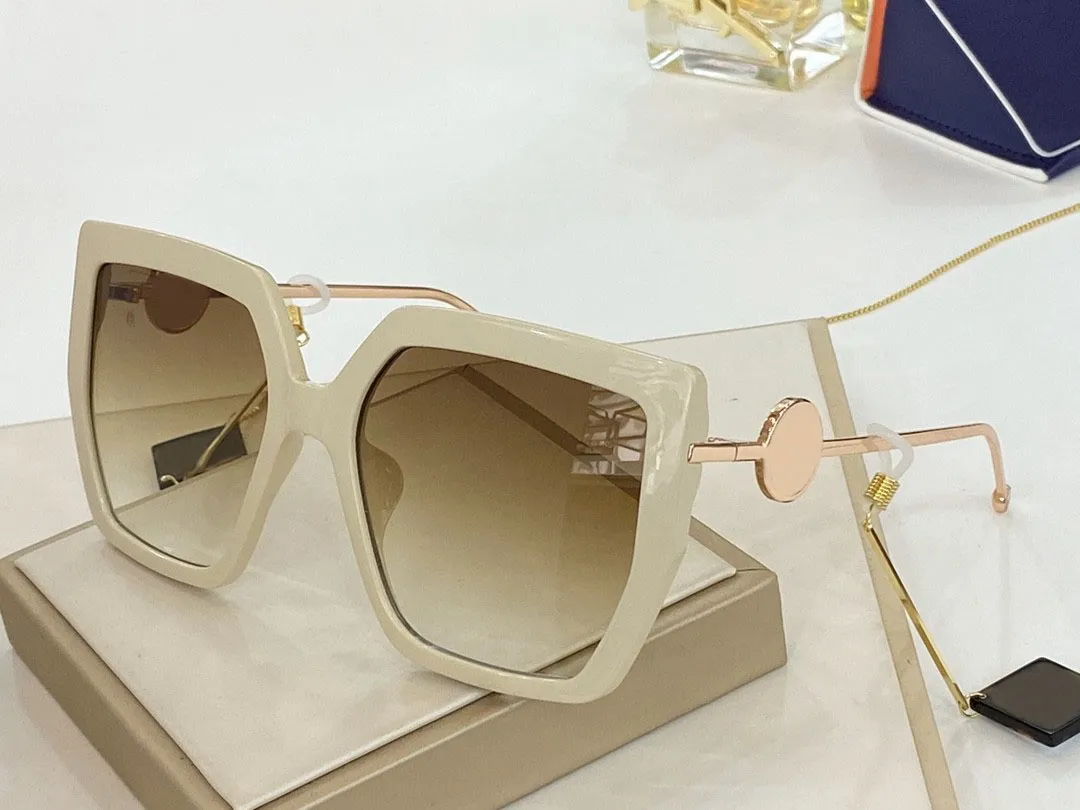 Okulary przeciwsłoneczne dla kobiet mężczyzn okularów słonecznych męskie 0410 Styl mody chroni oczy Oczy Uv400 z losowym pudełkiem 230o