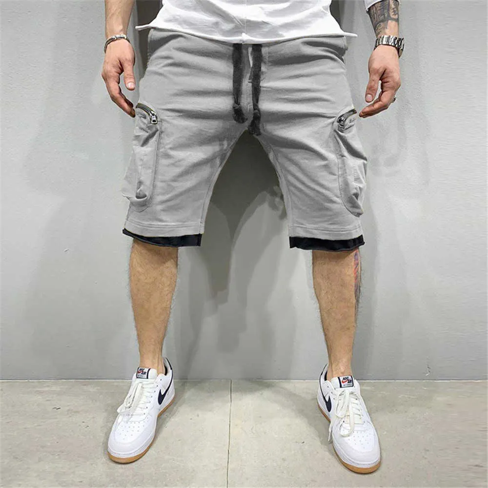 Cales de vero hip hop 2020 preto fitas streetwear bermuda homem shorts multi-bolso punk casual na altura do joelho calas cur X0601