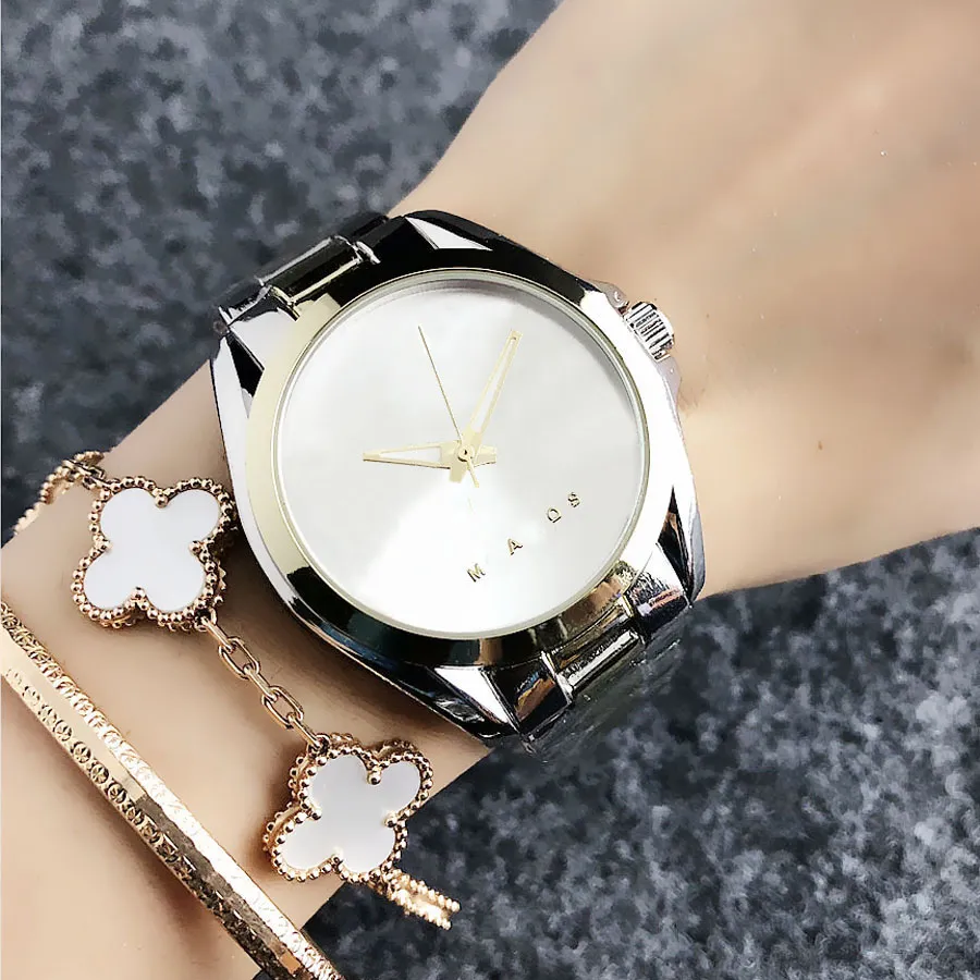 Relojes de marca para mujer y niña, reloj de pulsera de cuarzo con banda de acero y Metal con letras grandes, estilo M56213M