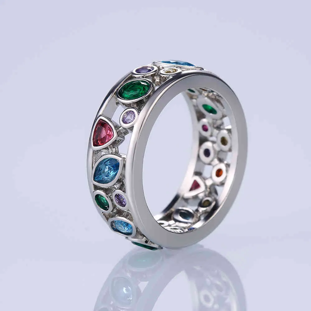Huitan カラフルな女性中空幾何石リングカクテルパーティー女性の指輪ファンシースタイリッシュなリングジュエリー卸売