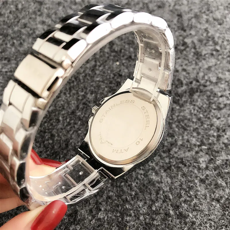 Montre de mode marque femmes hommes style métal bracelet en acier montres à quartz X44285d