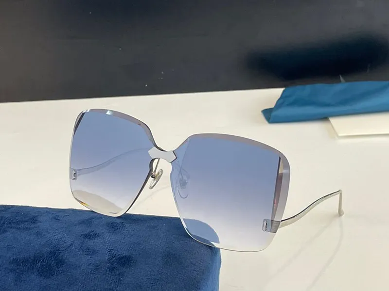 2001 Óculos de sol para feminino Moda Irsor de óculos de sol do revestimento sem moldura Lente de proteção UV Pernas de fibra de carbono estilo de verão Top Quality 202538