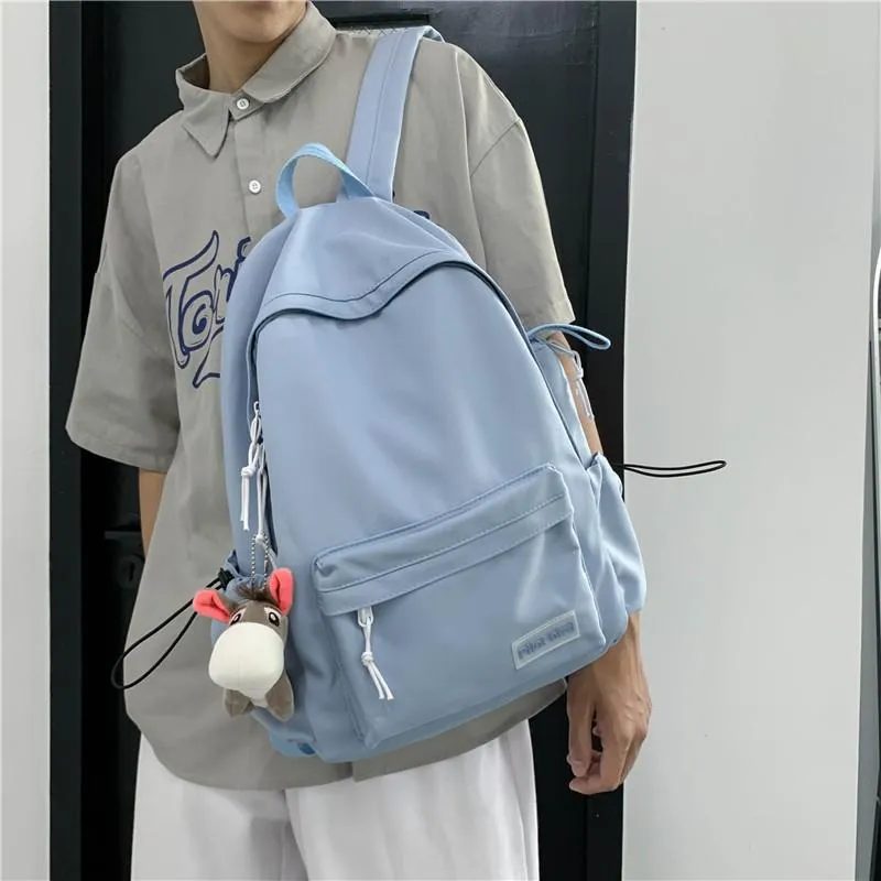 Skolväskor solid färg mode kvinnor ryggsäck söt hängväska för pojkar flickor duk stor kapacitet bärbara par ryggsäckar 2021267h