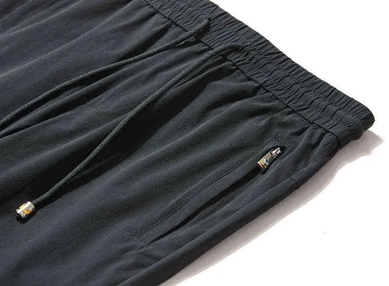 Летние мужские моды повседневные тонкие брюки мужские эластичные талии длинные брюки, растягивающие шелковистые удобные ткани 211201
