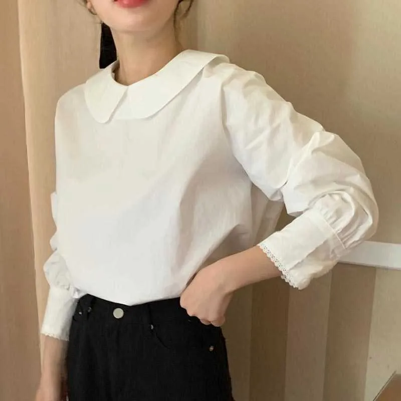 Korejpaa Dames Blouse Fashion Koreaanse Chic Gentle Cream Blue Solid Doll Collar Top Back Back Hollow Plooy Bubble Sleeve Shirt Elegant 210526