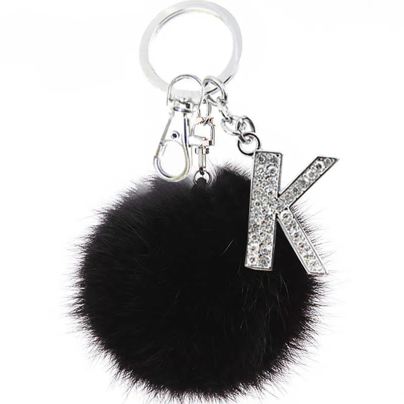 Teh y schwarze Pompom Faux Rabbit Fellkugel Schlüsselanlagen Kristall Buchstaben Schlüsselringe Schlüsselhalter Trendy Jewelry Bag Accessoires Geschenk G10191018125