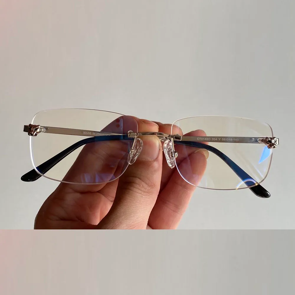 Uxury 디자이너 안경 광학 안경 표범 헤드 장식 프레임 림리스 안티 라운드 클래식 남자 액세서리 패션 S284C