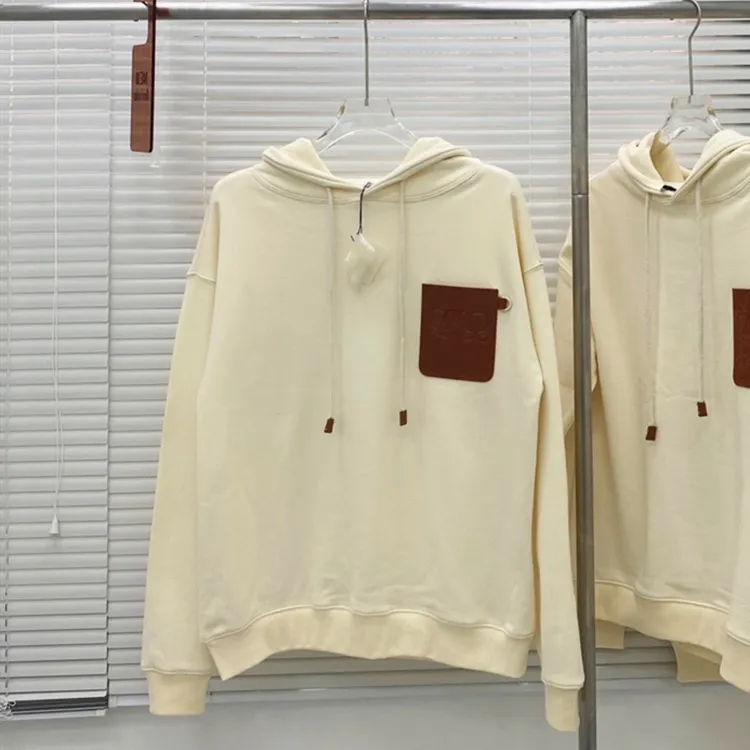 Etiqueta de couro bordado com capuz suéter fashion primavera e outono novo casal de lazer solto jaqueta grande de manga comprida