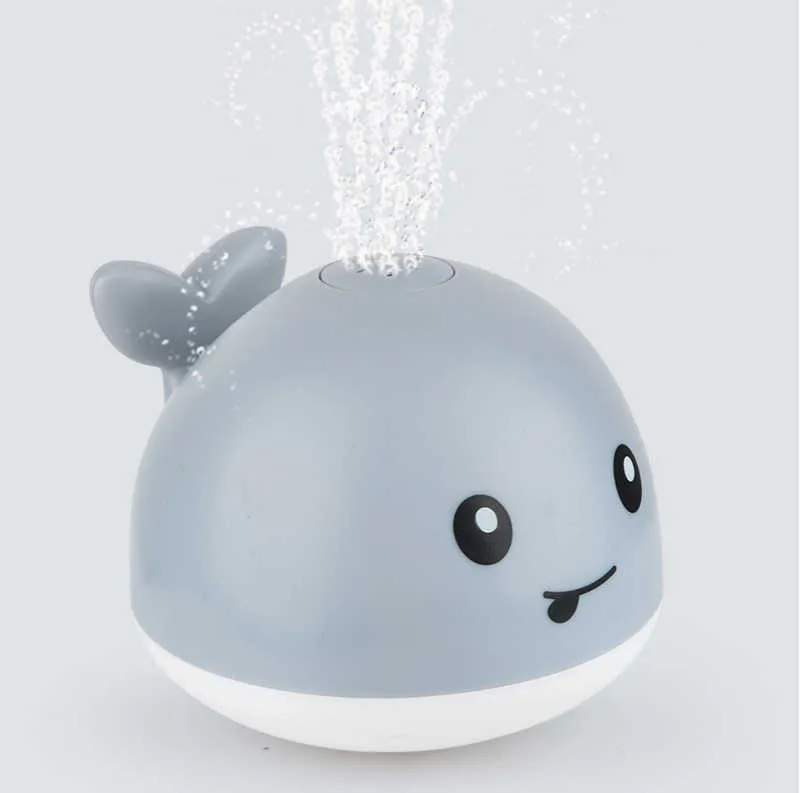 Badleksaker Vatten Baby Barn Whale Electric Induction Sprinkler Musik Färgglada Ljus Spela djur Swimming Float Toy 210712