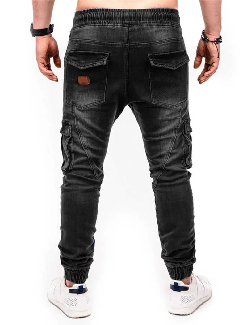 Мужчины высокого качества растягивающие джинсы эластичные талии Drawstring Multi-карманы спортивные брюки хип-хоп джинсовые мужские повседневные пробежки грузовые брюки X0621