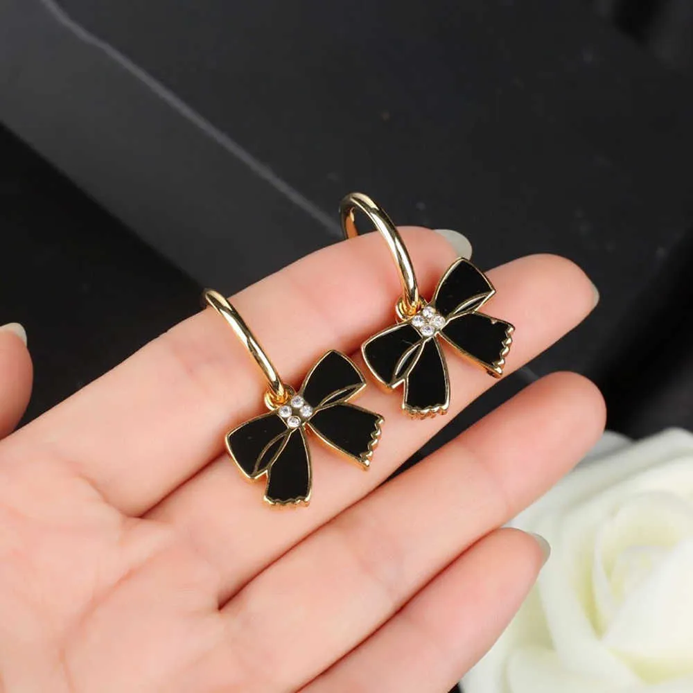 2021 Hot Brand Fashion Pearl Jewelry Cute Lovely Acrylic Black Bowknot Camellia Earrings Design Wedding Party Unique Earrings