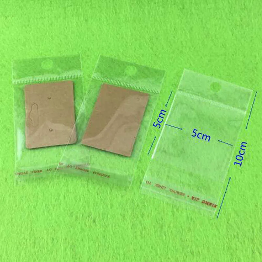 1000 st mycket klart självhäftande tätning av plastpåsar transparent återförslutningsbar cellofan poly förpackningspåsar OPP -väska med hängande hål T2250Q