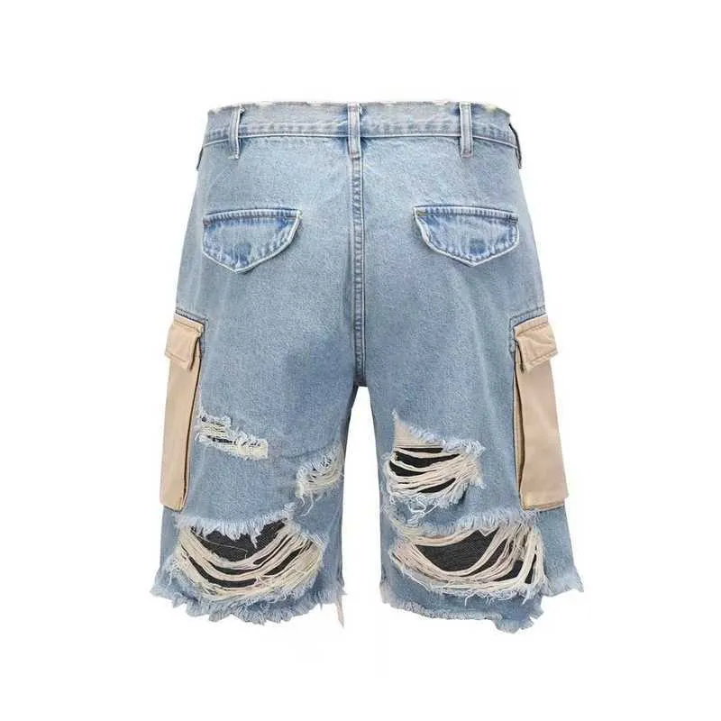 Herren-Shorts, High-Street-Stil, lockere, gerade Röhre, Messerschnitt, große Löcher, Gratquasten, gewaschene Katzenbart-Shorts