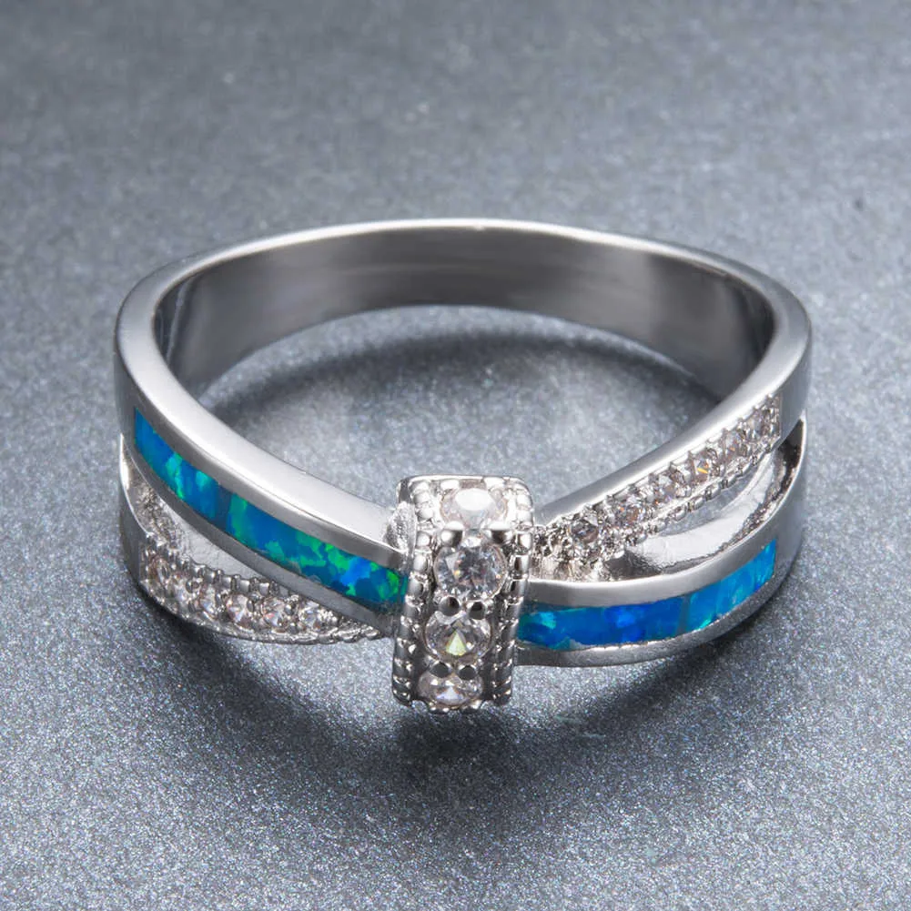 Lyxig Kvinna Blå Opal Sten Ringar Charm Silver Färg Tunna Bröllop Ringar För Kvinnor Söt Bride Crystal Bowknot Engagement Ring X0715