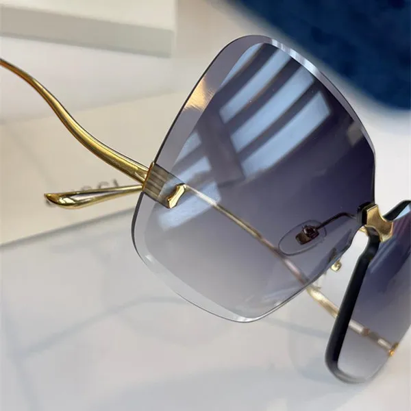 2001 Solglasögon för kvinnor mode wrap solglasögon ramlös beläggning UV -skyddslins kolfiber ben sommarstil toppkvalitet 20235t