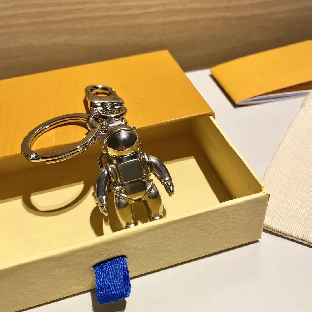 Roboterschlüsselketten Edelstahl Astronaut Schlüsselhalter Brauner Halskettenschlüsselkettenringhalter Schnalle Keychain Designerliebhaber Auto 9384319