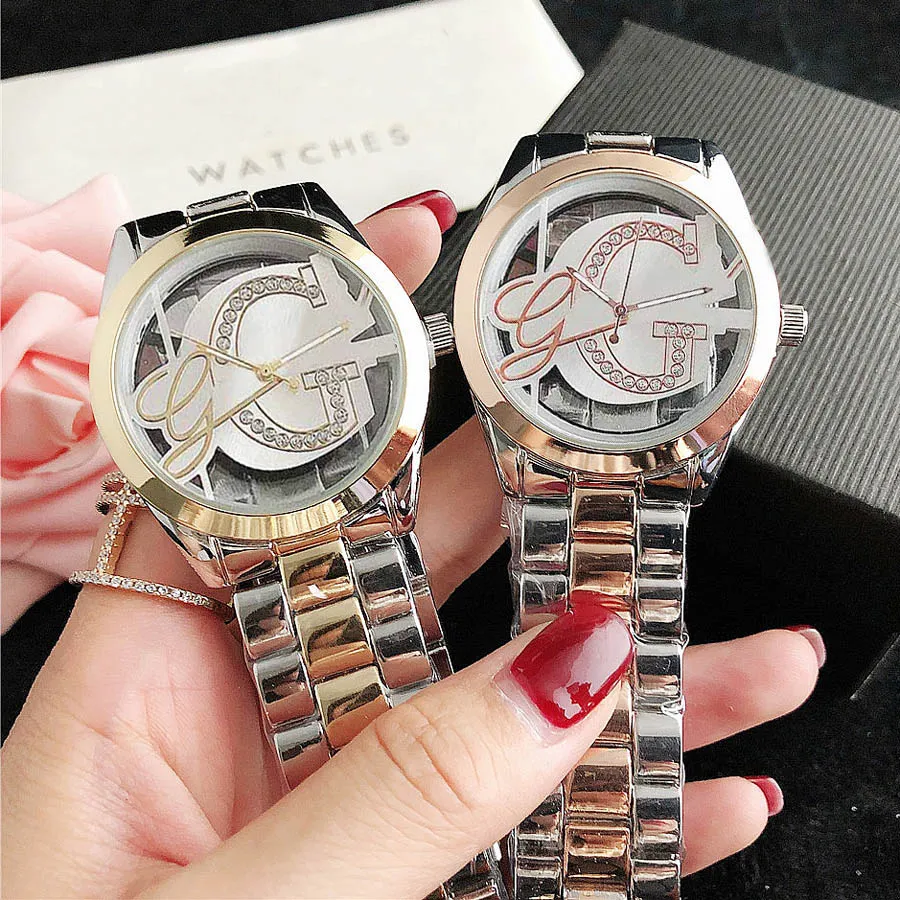 Marque montres femmes dame fille diamant cristal Triangle évider grandes lettres Style métal acier bande Quartz montre-bracelet GS40