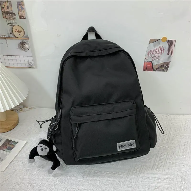 Sacs d'école couleur unie mode femmes sac à dos mignon pendentif sac pour garçons filles toile grande capacité ordinateur portable Couple sacs à dos 2021267h