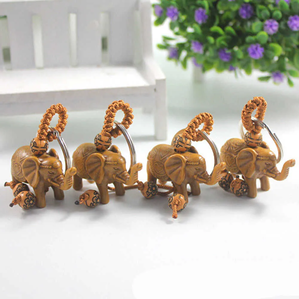 Porte-clés éléphant en acier inoxydable, 1 pièce, sculpture sur bois de pêche, Unique pour offrir des cadeaux, Pom mignon, G1019