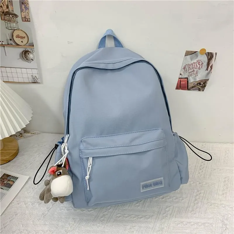 Mochilas escolares de color sólido para mujer, morral con colgante bonito para niños y niñas, mochilas de lona de gran capacidad para ordenador portátil 2021267h