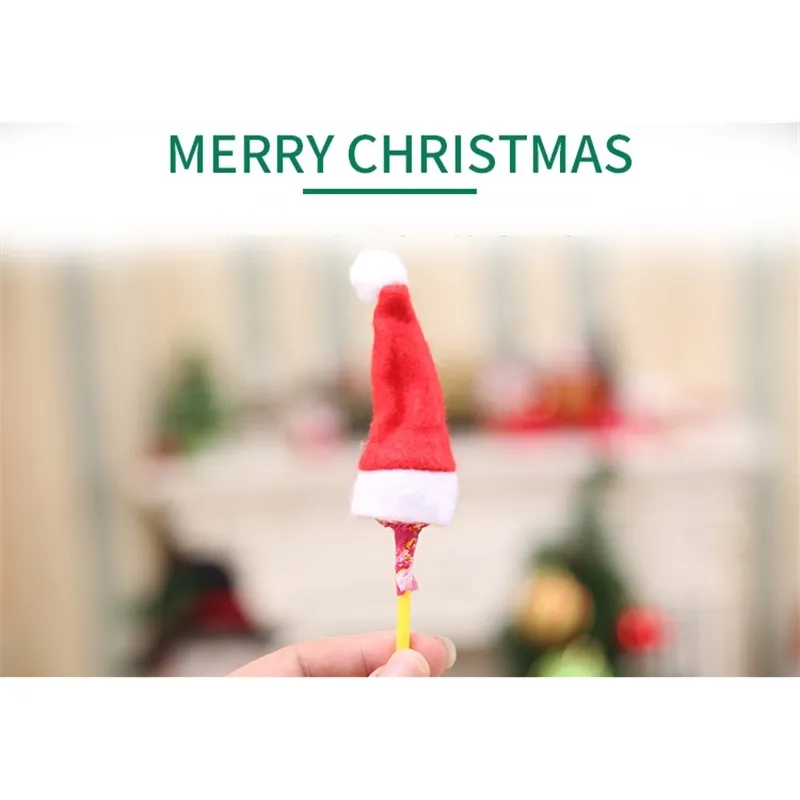 60 stuks Mini Red Candy Santa Claus Cap Niet-geweven hoed voor boom Ornament Christmas Party Decoration