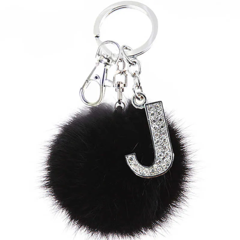 Teh y schwarze Pompom Faux Rabbit Fellkugel Schlüsselanlagen Kristall Buchstaben Schlüsselringe Schlüsselhalter Trendy Jewelry Bag Accessoires Geschenk G10191018125