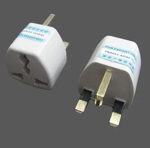 Convertitore plug-in da viaggio UE / USA / Regno Unito Alimentatore da viaggio universale AC Plug UK Standard