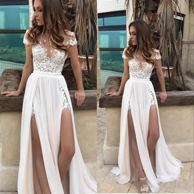 2018 A Line Wedding Dresses Jewel Neck Illusion Short Sleeves Chiffon Lace Appliques Split Sweep Train Overskirts Beach Bohemian Bridal Gown
