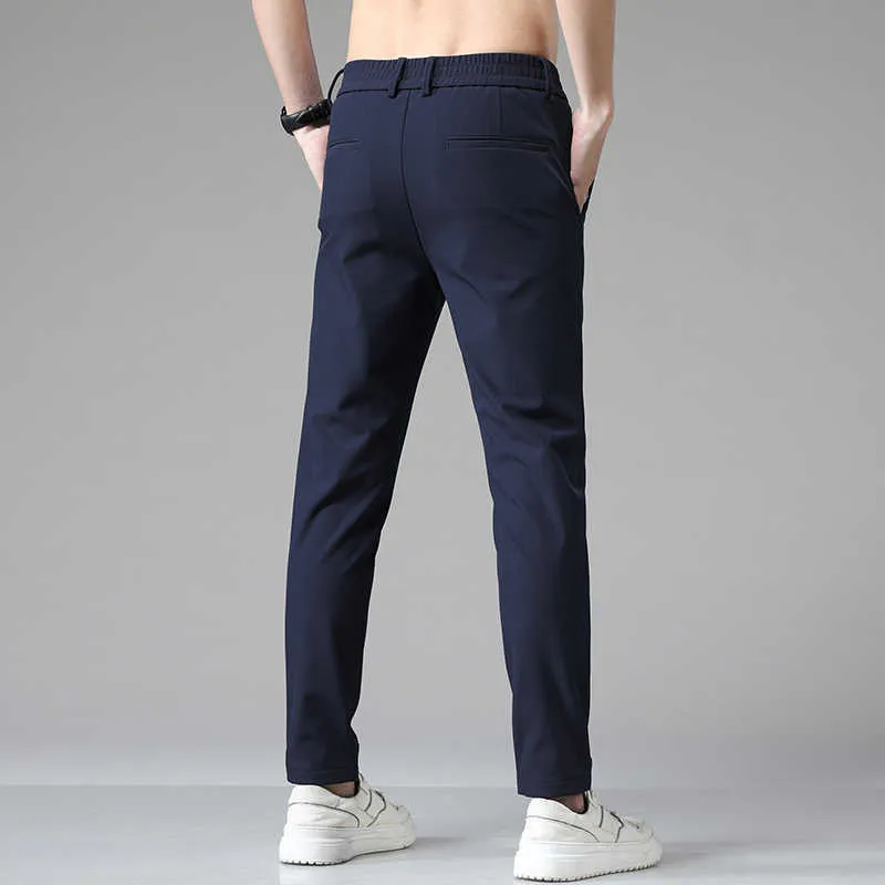 Letnie spodnie męskie Stretch Koreański Dorywczo Slim Fit Elastyczna Talia Jogger Business Classic Spodnie Mężczyzna Cienki 28-38,5008 210715