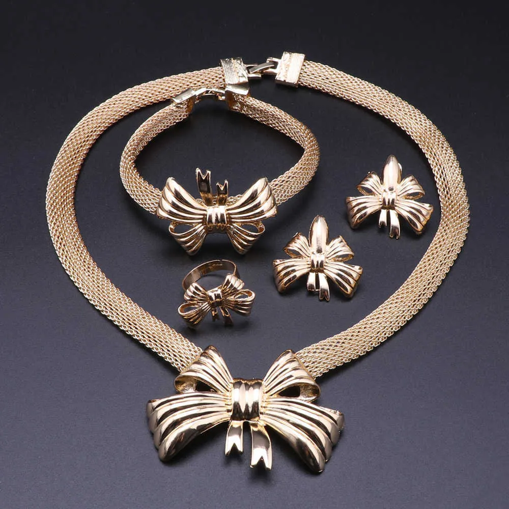 Conjuntos de jóias de cor de ouro de Dubai para mulheres casamento africano Charme Charme Brincos Bracelete Anel Pingente Jóias Conjunto H1022