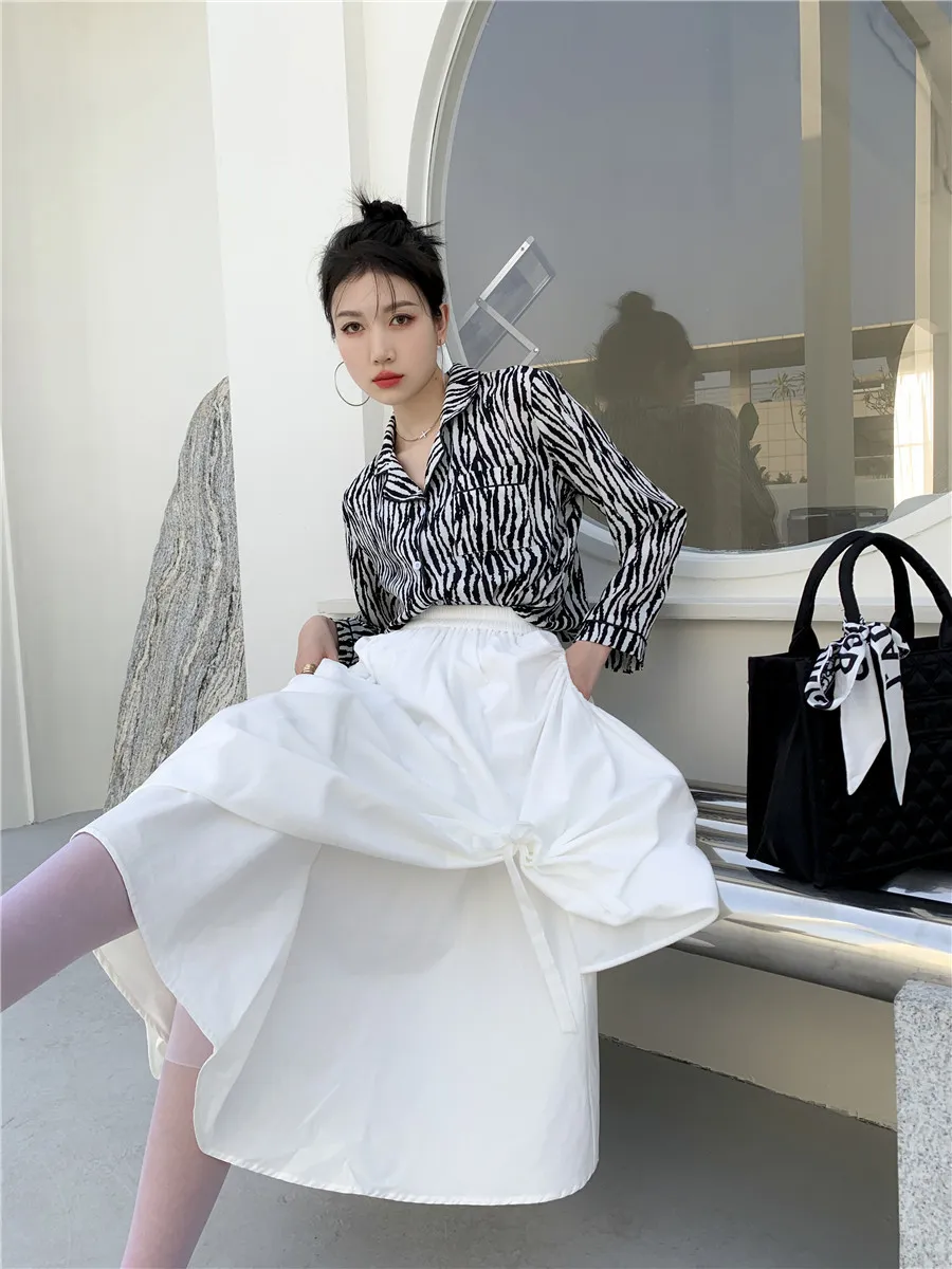 Jupe de velours blanc femmes taille haute couche élastique noeud papillon décontracté coréen long midi printemps hiver desinger 210427