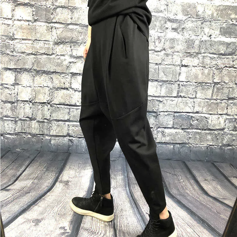 Pantalones holgados simples japoneses con entrepierna grande para otoño e invierno, pantalones harén finos y elásticos oscuros para hombre, informales negros puros 210715