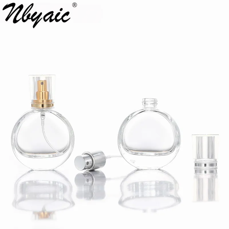 Perfume replacement bottle 25ml travel circular transparent glass empty bottle gold and silver nozzle press spray bottle